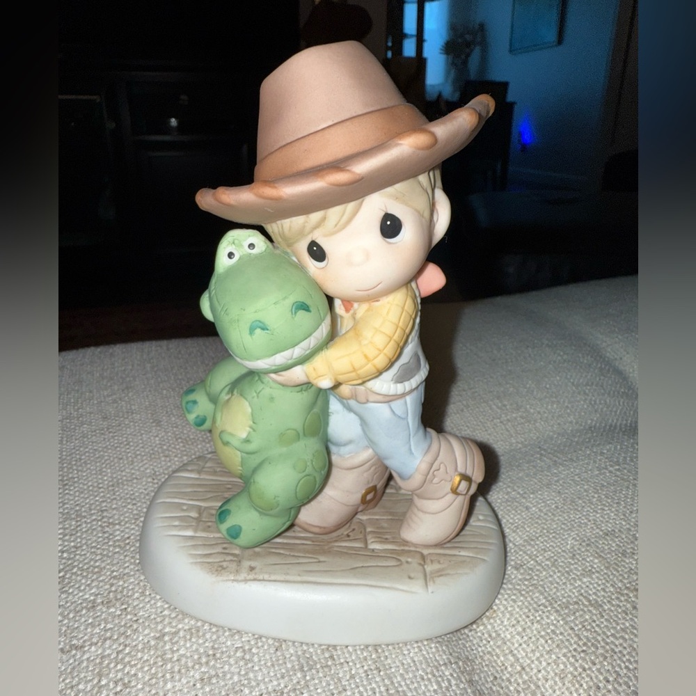 Disney Showcase Precious Moments “Our Love will Never go Extinct”